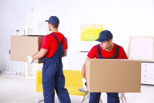 Local house removals service in Surrey Quays near modern apartment buildings