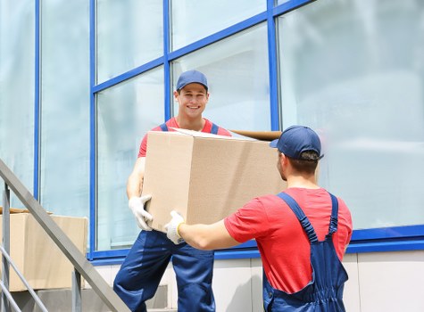 Man with van loading furniture in Surrey Quays