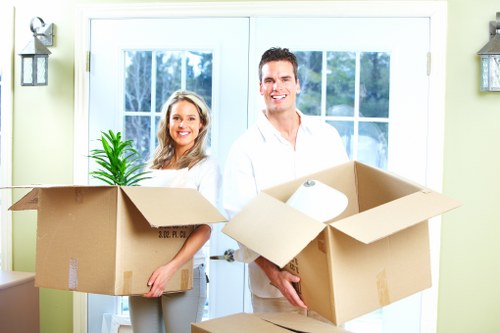 Packed boxes and furniture prepared for a Surrey Quays move