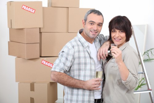 Packed boxes and furniture ready for local removal service